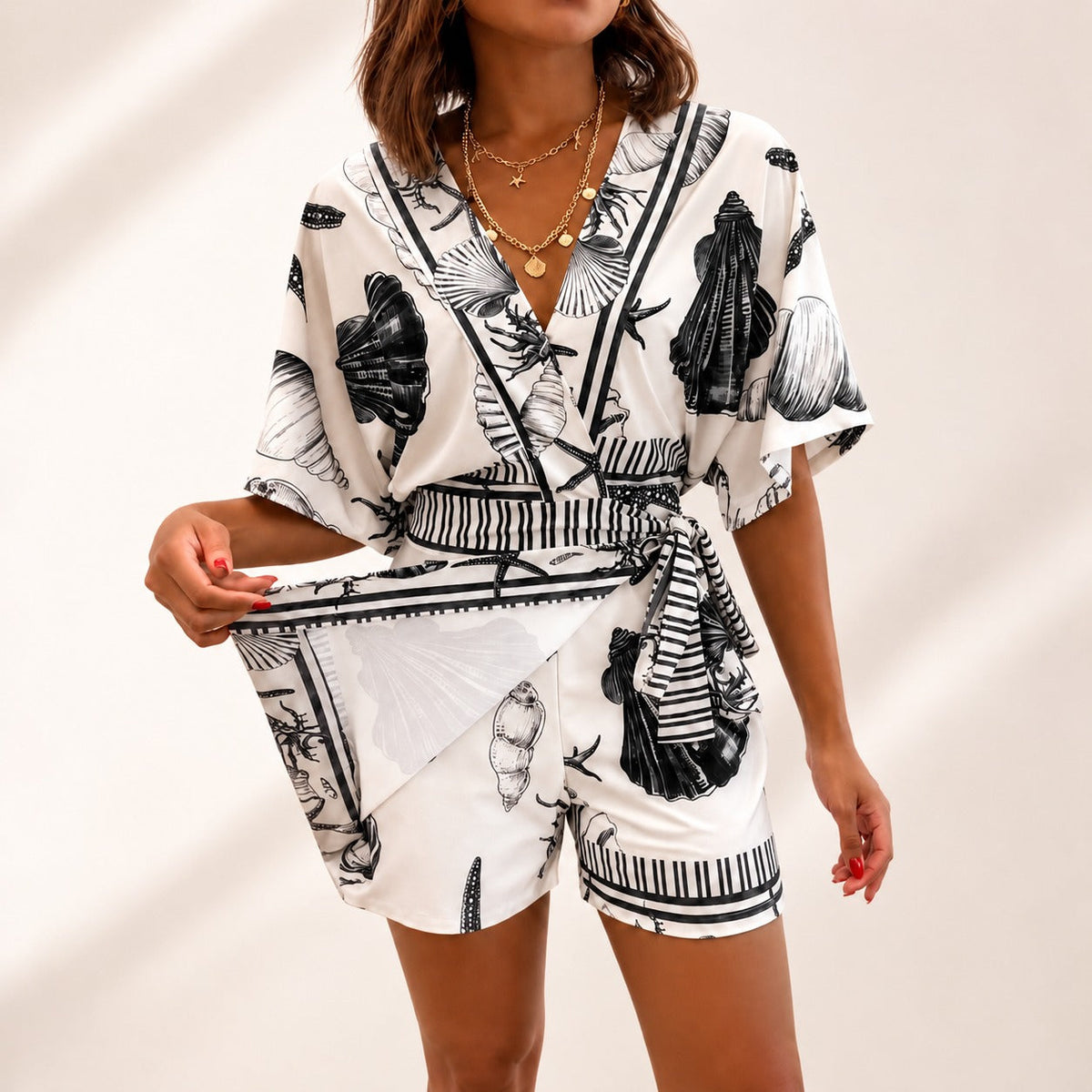 Azzurine Romper With Skirt Overlay And Side Tie - Nora & Rose Maine, view 3
